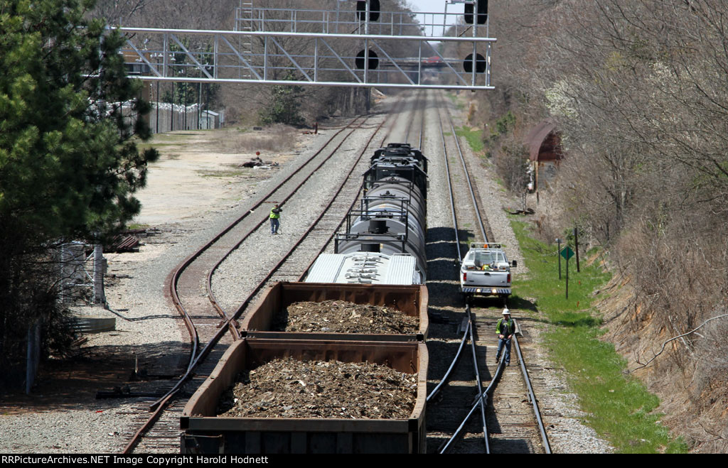 NS 4617 leads train E60 past the signals at Boylan and a track inspector
